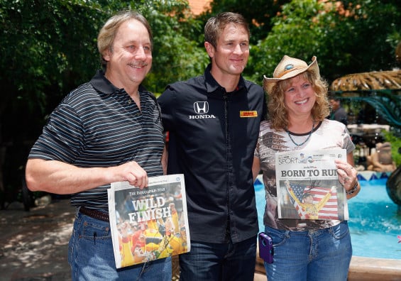 2014 Indianapolis 500 Champion's Luncheon With Ryan Hunter-Reay FORT WORTH, TX - MAY 28: Reigning Indianapolis 500 champion Ryan Hunter-Reay, driver of the #28 DHL Andretti Autosport Chevrolet Dallara, poses with fans showing off his win on the front pages of the Indianapolis Star newspaper during the Indianapolis 500 Champion's Luncheon hosted by Texas Motor Speedway at the iconic Joe T. Garcia's Restaurant on May 28, 2014 in Fort Worth, Texas.Hunter-Reay won the second-closest Indy 500 in history Sunday to become the first American winner since 2006. (Photo by Tom Pennington/Getty Images for Texas Motor Speedway)