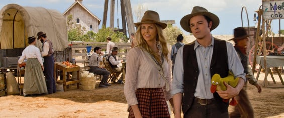 Film Title: A Million Ways to Die in the West Anna (CHARLIZE THERON) and Albert (SETH MACFARLANE) try not to die at the fair in "A Million Ways to Die in the West", the new comedy from director, producer and co-writer MacFarlane, who plays a formerly cowardly sheep farmer who must put his newfound courage to the test. Photo Credit: Universal Pictures Copyright: © 2014 Universal Studios. ALL RIGHTS RESERVED.