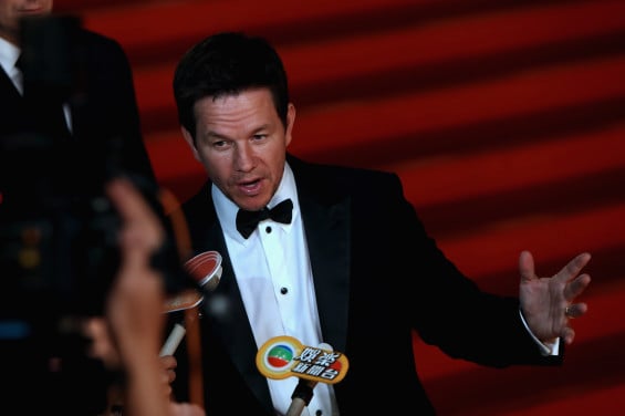 SHANGHAI, CHINA - JUNE 22: Mark Wahlberg accepts the interview attending the red carpet for the worldwide premiere screening of 'Transformers: Age of Extinction' on June 22, 2014 in Shanghai, China. (Photo by Hong Wu/Getty Images for Paramount)