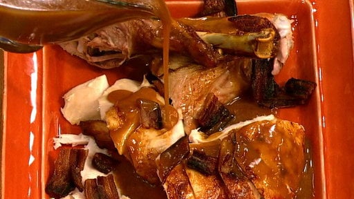 Learn how to make Grace Parisi's roasted beer-brined turkey with onion gravy and bacon for Thanksgiving with the recipe she shared on "The Chew"!