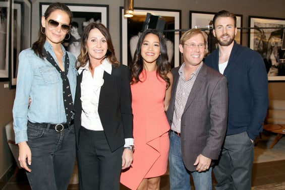 LOS ANGELES, CA - FEBRUARY 21: (L-R) Actress Katie Holmes, Gold Meets Golden Hosts Olympic Medalist Nadia Comaneci, actress Gina Rodriguez, Olympic Medalist Bart Conner, and actor Chris Evans attend CW3PR presents Gold Meets Golden at Equinox Sports Club on February 21, 2015 in Los Angeles, California. (Photo by Rachel Murray/Getty Images for CW3PR Gold Meets Golden)