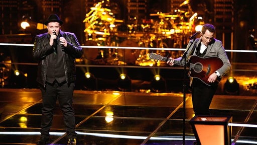 Brian Johnson vs. Joshua Davis of Team Blake Shelton sing Bob Dylan's classic "Knockin' On Heaven's Door" during last night's battle round on "The Voice"!