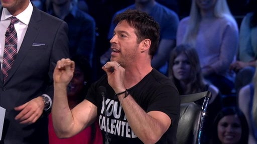 American Idol: Harry Connick, Jr. deconstructs his "You're Talented" shirt and shows off his "guns".