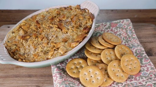 Learn how to make the amazing creamy buttery crab dip recipe that Clinton Kelly and chef Michael Symon made on "The Chew" on Thursday, April 2nd, 2015.