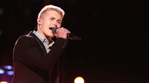 The Voice season 8 episode 14 Live Playoff Round night one: Corey Kent White sings Garth Brooks hit song "Make You Feel My Live" on Monday, April 6, 2015.