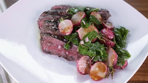 Learn how to make the delicious grilled flat iron steaks with white anchovy butter and roasted radish salad that chef Michael Symon and "The Heidi Chronicles" Jason Biggs made on "The Chew" on Wednesday, April 22, 2015.