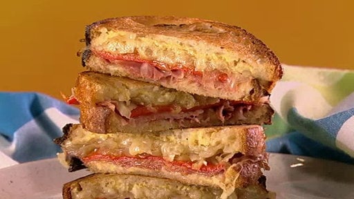 Chef Mario Batali and chef Michael Symon show us how to make a delicious grilled cheese Espanol and late night Salami sandwich on the Thursday, May 6, 2015 episode of "The Chew"!