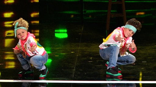 America's Got Talent season 10 episode 8: Adorable dancing duo Elin and Noah impress Nick Cannon and the judges with their dance routine to Tag Team's "Whoomp! There It Is".