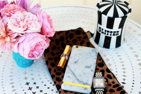 Candace Rose Love my marble iPhone 6s plus case for fall! Also in photo: Michele watch, YSL lipstick, Clare V leopard print clutch, Jonathan Adler Glitter container. candie anderson