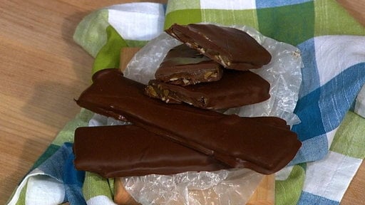 On the September 11th episode of "The Chef" chef Michael Symon shares his recipe for happy bars, which are his take on heath bars.