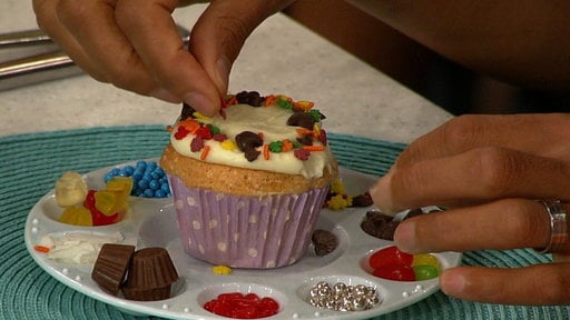 Individual cupcake stations are fun for a kid's birthday party! Be sure to check out "The Chew's" Clinton Kelly for more great tips.