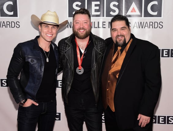 SESAC 2014 Nashville Music Awards - Arrivals NASHVILLE, TN - NOVEMBER 02: Artists Dustin Lynch, Cary Barlowe and Tim Fink Vice-President, Writer/Publisher Relations, SESAC attend the SESAC 2014 Nashville Music Awards at Country Music Hall of Fame and Museum on November 2, 2014 in Nashville, Tennessee. (Photo by Michael Loccisano/Getty Images for SESAC)