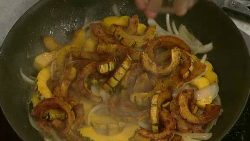 Chef Michael Symon prepares his squash tarte tatin with organic Delicata squash and onions and fresh ingredients on Wednesday's episode of "The Chew". Doesn't this looks amazing!