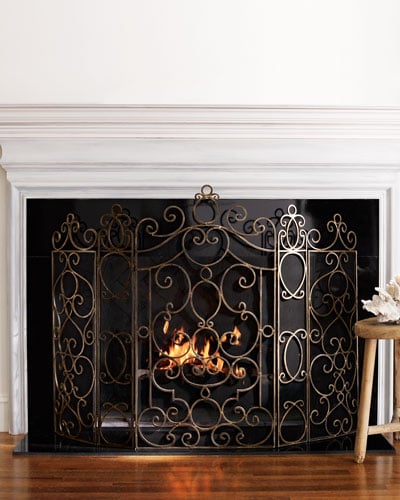 Parisian balcony railings in antiqued brass finish Neiman Marcus Candace Rose ornate fireplace screens