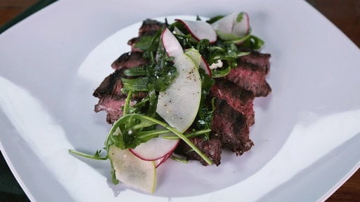 Learn how to make the delicious marinated skirt steak with arugula radish salad that chef Michael Symon made on "The Chew" on Wednesday, March 4th.