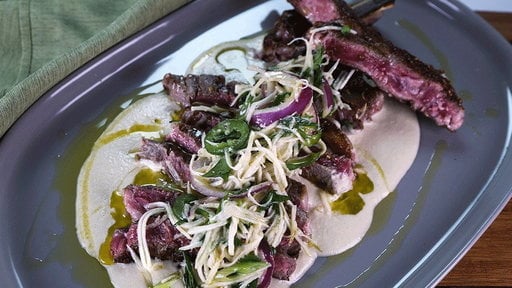 Chef Michael Symon shares the secret to making delicious seared ribeye with celery root salad and white bean puree on the Monday, March 16, 2015 episode of "The Chew"!