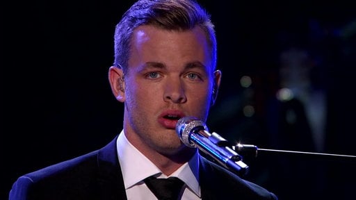 American Idol season 14 episode 25 American Classics: Clark Beckham sings Frank Sinatra's "Moon River" while playing the piano.