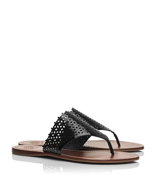 Tory Burch FLORAL PATENT PERFORATED FLAT THONG SANDAL in Black
