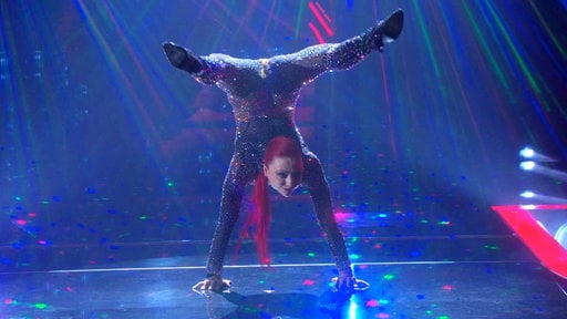 America's Got Talent season 10 episode 15 Live Round 1: 33 year old contortionist and hand-balancer Vita Radionova of Seattle, Washington flips the competition on its head with a captivating routine.