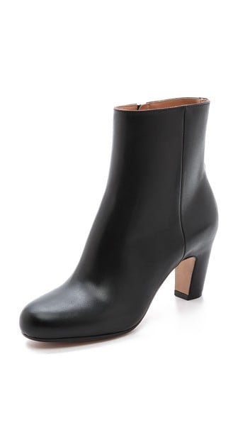 Maison Margiela Leather Booties in Black. Shopbop