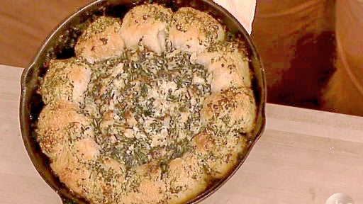 Watch Clinton Kelly and chef Carla Hall make delicious garlic bread spinach artichoke dip on the Monday, October 2, 2017 episode of "The Chew."