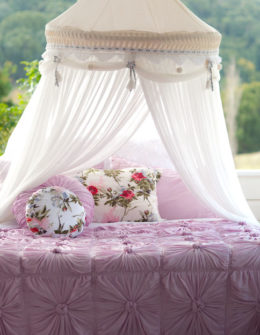 lazybones australia pink rosette bedding with a canopy