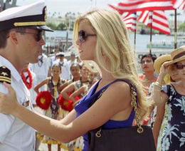 Taylor Kitsch stars and Hooper and Brooklyn Decker stars as his fiancee Sam Shane in the movie Battleship.