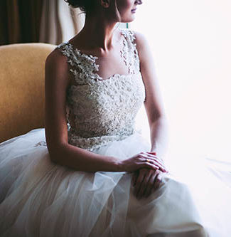 Brides magazine's Michelle Myers joined journalist and blogger, Candace Rose Anderson of the website Candie Anderson to share the top wedding trends. She dished on where to save money and where to skimp! Image of woman in bridal gown by Tiko Giorgadze on Unsplash