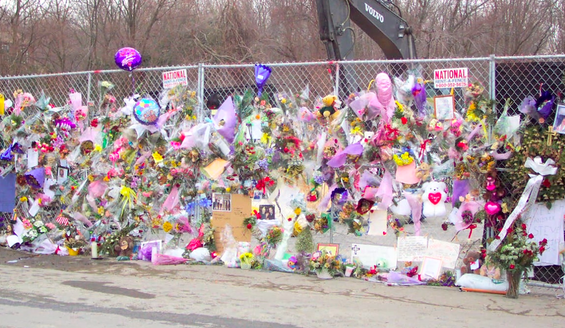 Flowers and balloons were placed in honor of the 100 people who were killed during the Great White concert on February 20, 2003. The Station Nightclub fire is the fourth deadliest nightclub fire in U.S. history