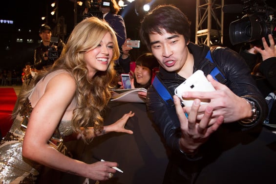  SEOUL, SOUTH KOREA - MARCH 11: Actress Adrianne Palicki poses with fan during the 'G.I. Joe - Retaliation' Seoul World Premiere at Times Square on March 11, 2013 in Seoul, South Korea. (Photo by Han Myung-Gu/Getty Images for Paramount Pictures)