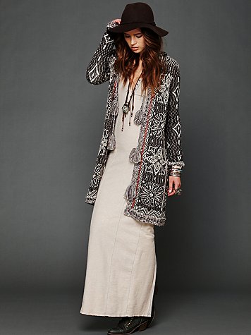 Patterned knit long pom pom cardigan in black and white
