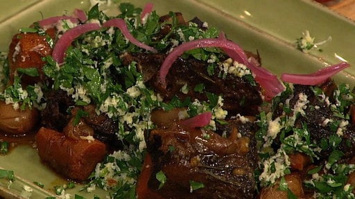 The Chew chefs Mario Batali and Michael Symon topped their braised short ribs with pearl onions and potatoes with pickled red onions!