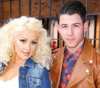 Pop sensation Christina Aguilera and team advisor Nick Jonas are looking to bring their team to victory on "The Voice" season 8.