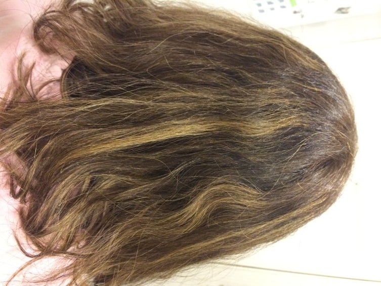 Yikes, what a mess! This is what my thick, wavy and frizzy hair looks like before I flat iron it. 