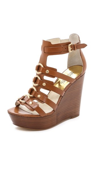 MICHAEL Michael Kors Tan Nadine Wedge Sandals with gold hardware 