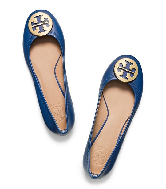 Tory Burch REVA BALLET FLAT in Greek Blue/Gold. Not shown: Poppy Coral/Gold or Vanilla/PewterTory Burch REVA BALLET FLAT in Greek Blue/Gold. Not shown: Poppy Coral/Gold or Vanilla/Pewter