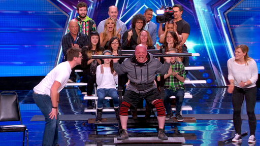 Watch America's Got Talent! Strongman 6PackLapadat lifts a bleacher full of people to stun the judges.
