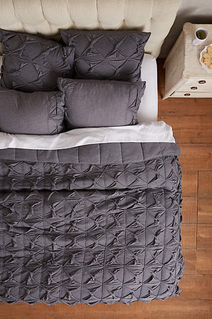 Twined Jersey Quilt in Dark Grey by Lazybones. Anthropologie