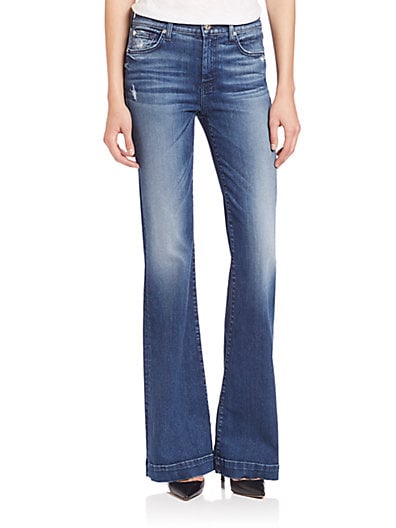7 For All Mankind Dojo Distressed Flared Jeans in Lake Blue. Saks Fifth Avenue