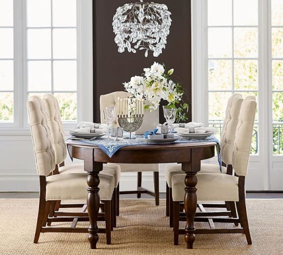 EVELYN EXTENDING ROUND DINING TABLE. Pottery Barn