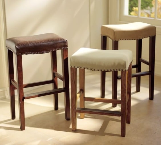 Pottery Barn MANCHESTER BACKLESS BARSTOOL in Light Wheat Everyday Suede or Antique Dark Brown Leather Upholstery.