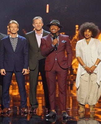 America's Got Talent host Nick Cannon poses with the season 11 contestants for the first round of judge cuts. This episode originally aired on Tuesday, July 12, 2016.