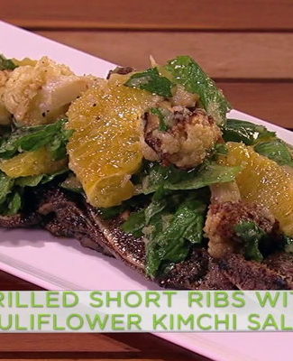 Watch chef Michael Symon show fabulous cook and Steph Curry's better half, Mrs. Ayesha Curry how to make grilled short ribs with cauliflower kimchi salad on the Wednesday, February 8, 2017 episode of "The Chew."