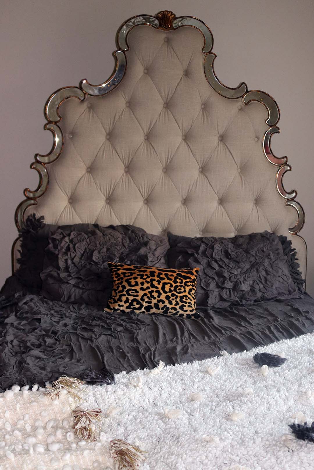 The Georgina duvet cover in dark grey looks great with my leopard print pillow and on upholstered bed!