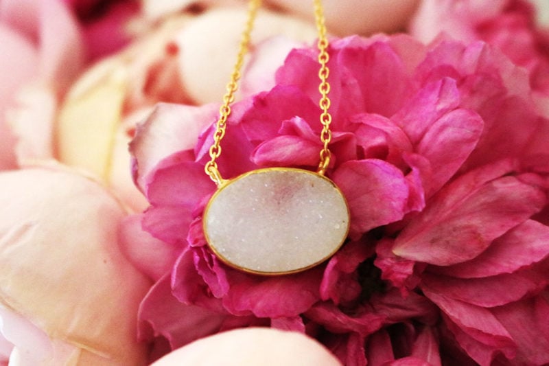 fashion and lifestyle blogger candace rose shares rosecandi garden roses and her crown jewelry white druzy necklace.