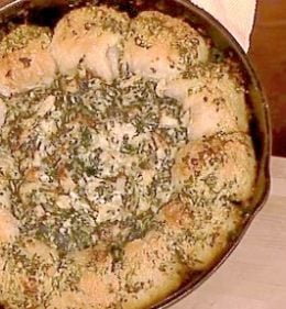 Watch Clinton Kelly and chef Carla Hall make delicious garlic bread spinach artichoke dip on the Monday, October 2, 2017 episode of "The Chew."
