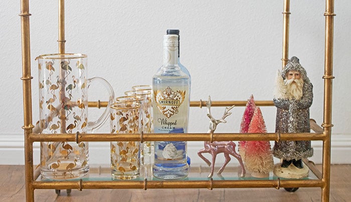 rosanna flamingo pitcher highball glasses whipped cream vodka ombre reindeer glitter santa claus candace rose anderson candieanderson holiday bar cart