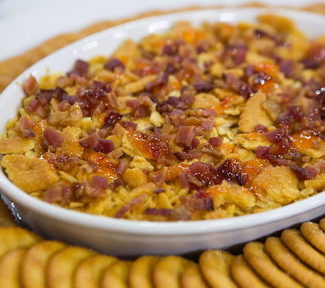 Watch Elizabeth Heiskell aka the Debutante Farmer show Carson Daly (and all of us at home) how to make a delicious holiday appetizer and holiday dessert using Ritz crackers! You will absolutely adore the fabulous big, festive holiday dip and chocolate turtle Ritz cracker cookies that Elizabeth made on the Thursday, December 21, 2017 episode of the Today show.