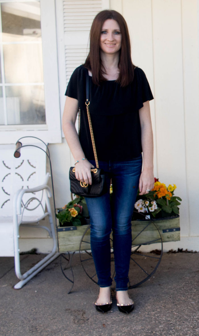 Candace Rose Anderson of CandieAnderson.com accessorizes her off Tobi the shoulder top with a Gucci handbag, AG jeans and Valentino Rockstud ballet flats for spring.