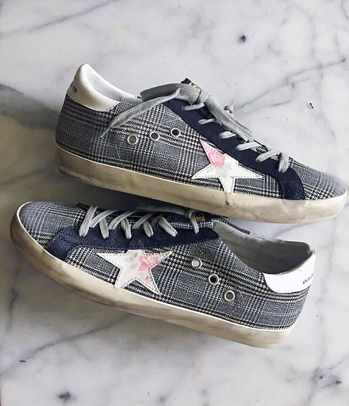 Style expert Candie Anderson shares her favorite tweed Golden Goose sneakers with a floral logo. They are one of the best shoes for spring 2018.